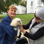 Mother Jeanne of St. Peter's Episcopal Church blesses pets at the Cazenovia farmer's market on Saturday, October 1st.