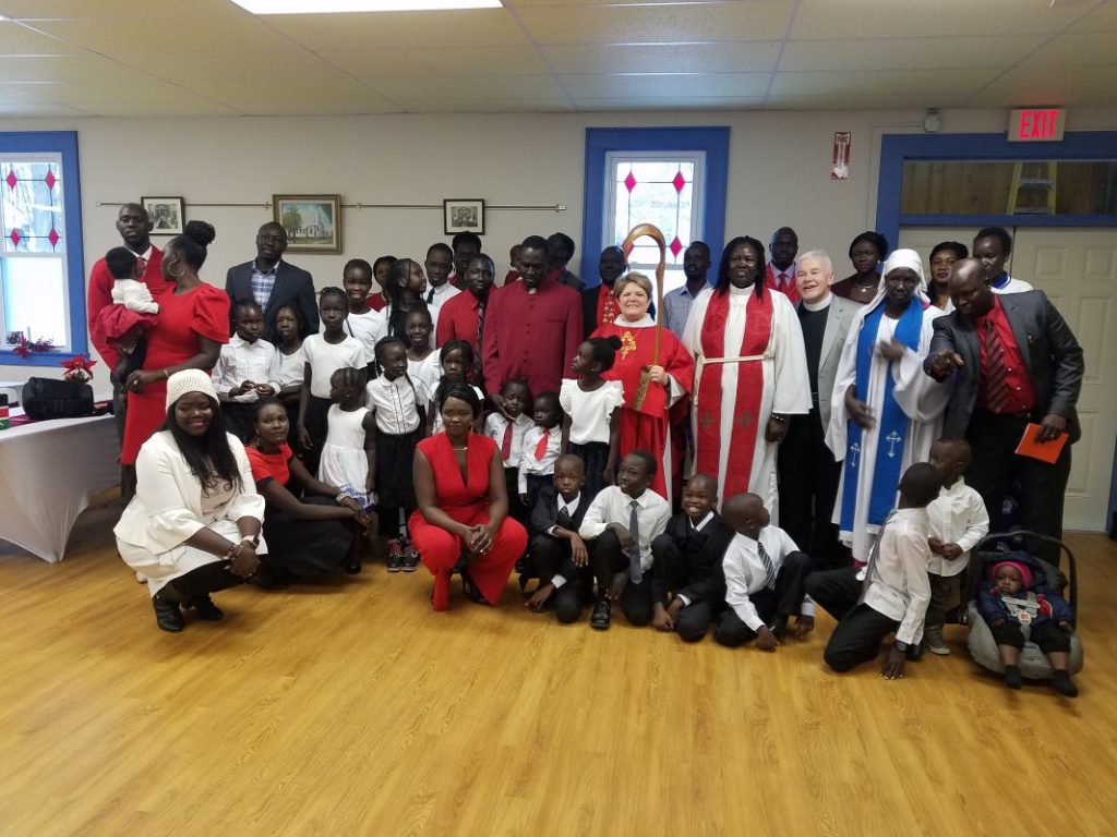 2018-12-23-east-syracuse-malek-chapel-congregation-with-bishop-dede-and-canon-john