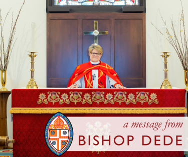Image Description: Bishop DeDe stands behind an altar with a red frontal wearing a red chasuble and stole. She's smiling as she looks toward the camera. The bottom of the image reads "A message from Bishop DeDe," with the seal of the diocese.